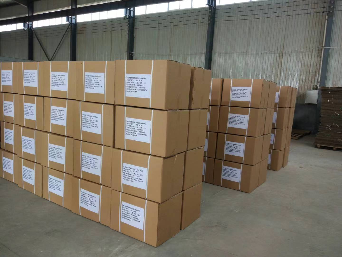 Export-ready packaged products inside the Jianan Insulation factory